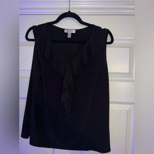 Sleeveless V-neck top with ruffle in front